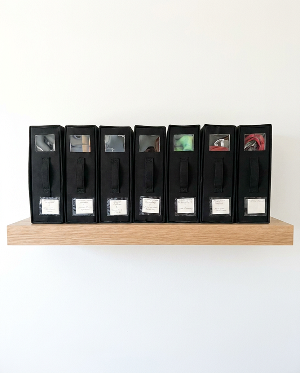 True Backdrops backdrop storage organizer in a 4-pack, showing compact, foldable fabric storage cases for easy backdrop organization.