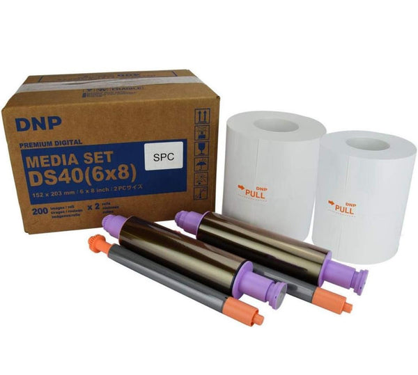 Two rolls of DNP 6x8-inch perforated print pack for DS40 printer by True Backdrops, showing perforated print sheets.