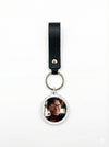 Event-ready acrylic photo keychain set with straps, featuring custom photo booth accessories by True Backdrops.