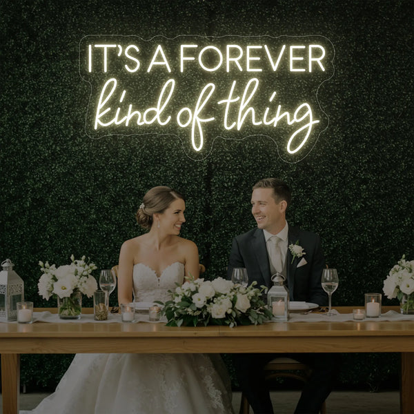 Wedding neon sign reading "It's a Forever Kind of Thing" by Light Your Way, featuring bright LED illumination on a dark background.