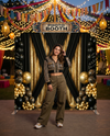 True Backdrops Midnight Gilded Noir Pillowcover backdrop showing a luxurious black pillowcover with gold accents in a stylish lifestyle setting.