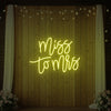 Light Your Way Miss to Mrs Wedding Neon Sign in vibrant pink and white LED lights, ideal for wedding decor.
