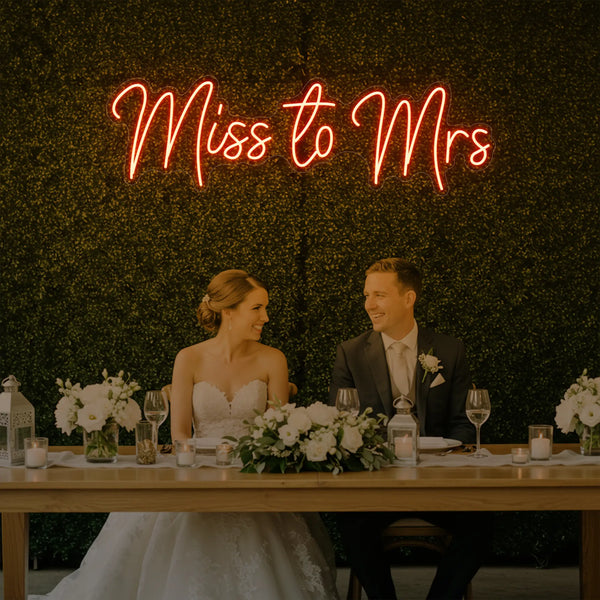 Light Your Way Miss to Mrs Neon Sign for weddings, featuring illuminated "Miss to Mrs" lettering on a vibrant neon display.