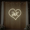 Custom wedding initials neon sign by Light Your Way, featuring personalized glowing initials for wedding decor.