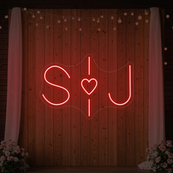 Custom wedding initials neon sign by Light Your Way, featuring personalized illuminated initials for wedding decor.
