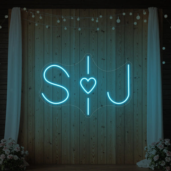 Custom wedding initials neon sign by Light Your Way, featuring elegant illuminated initials for wedding decor.