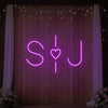 Wedding initials custom neon sign by Light Your Way, featuring illuminated initials perfect for wedding decor.
