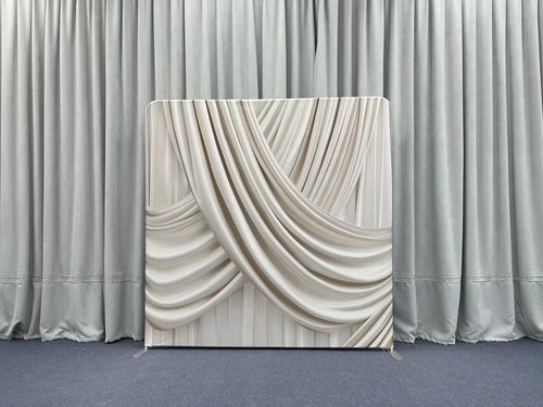 Champagne silk drapes pillowcover backdrop with soft, luxurious fabric and elegant design for photography or decor settings.