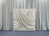Champagne silk drapes pillowcover backdrop with soft, luxurious fabric and elegant design for photography or decor settings.