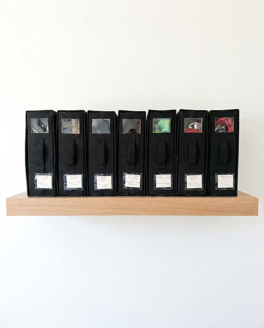 True Backdrops backdrop storage organizer in a 4-pack, showing compact, foldable fabric storage cases for easy backdrop organization.