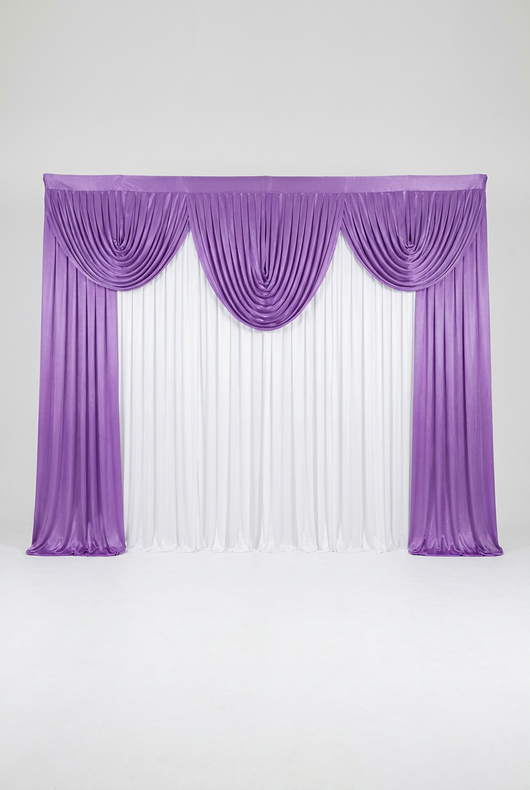 True Backdrops pre-swagged drapery backdrop with pole pocket hanging style, featuring soft, flowing fabric for photography or event use.