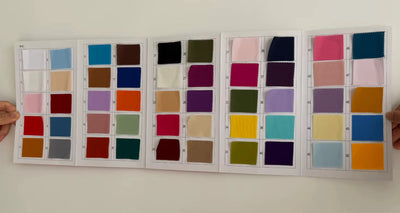 Pre-pleated drapery backdrop with pole pocket from True Backdrops, showing soft fabric with pleats and a hanging rod at the top.