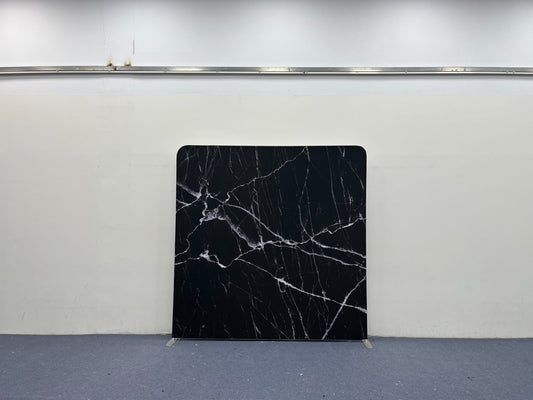 Double-sided black and white marble backdrop cover by True Backdrops, showing realistic marble patterns and texture.
