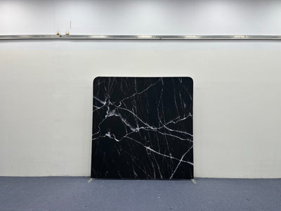 Double-sided black and white marble backdrop cover by True Backdrops, showing realistic marble patterns and texture.