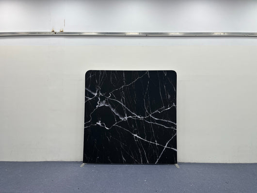 Double-sided black and white marble backdrop cover by True Backdrops, showing realistic marble patterns and texture.