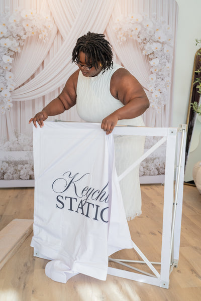 Keychain Station Starter Pack by True Backdrops, featuring colorful keychains and accessories on a neutral background.