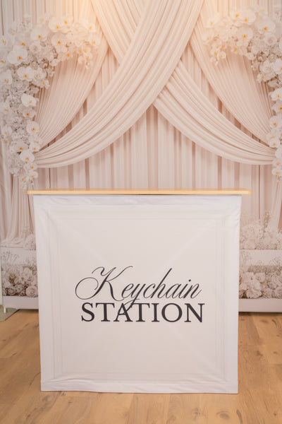 Keychain Station Starter Pack by True Backdrops, featuring colorful keychains and accessories on a display board.