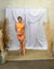 Pre-pleated drapery backdrop with pole pocket from True Backdrops, showing fabric with pleats and a built-in pole pocket for easy hanging.