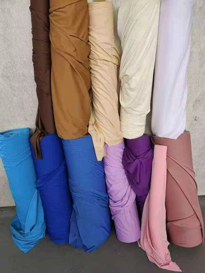 Pre-pleated drapery backdrop with pole pocket by True Backdrops, showcasing a smooth, pleated fabric hanging from a pole.