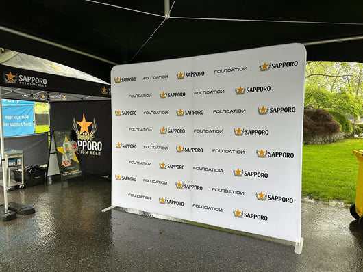 Custom pillow cover backdrop by True Backdrops, single-sided with a vibrant, textured fabric in neutral tones.