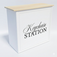 RecycleDisplay Keychain Station Fabric Pop Up Counter setup with fabric panels and display accessories.
