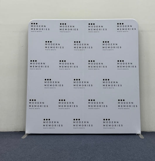 Custom pillow cover backdrop from True Backdrops, showing a double-sided fabric with vibrant printed designs and seamless edges.