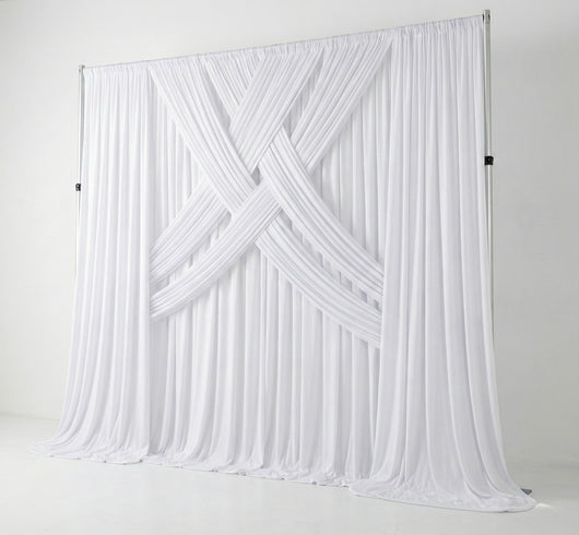Pre-pleated drapery backdrop with pole pocket from True Backdrops, showing elegant fabric hanging neatly for photography or decor.