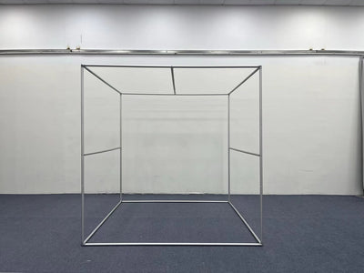 RecyclingDisplay 8x8x8 3D photography enclosure used as a room scene photo booth backdrop in a professional studio setting.