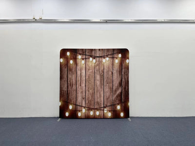 Wood and lights themed pillow cover backdrop by True Backdrops, featuring rustic wood textures and string lights for cozy decor.