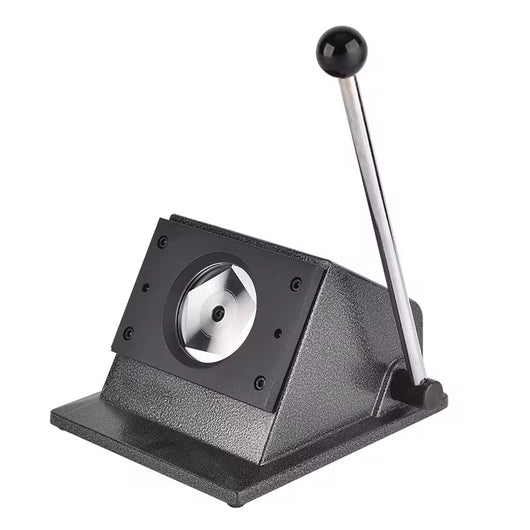 True Backdrops 35mm button paper cutter and circle punch, showing the compact cutting and punching tools on a workspace.