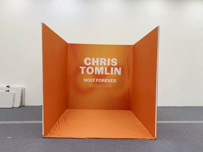 RecycleDisplay 8x8x8 premium 3D photo booth backdrop in a room scene, showcasing a versatile photography enclosure.