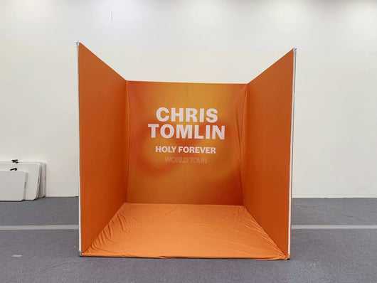 RecycleDisplay 8x8x8 premium 3D photo booth backdrop in a room scene, showcasing a versatile photography enclosure.