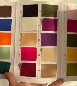 Pre-pleated drapery backdrop with pole pocket from True Backdrops, featuring soft fabric and hanging hardware on a neutral background.