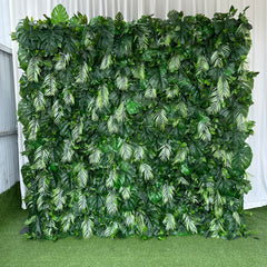 Luxe orchid flower wall by True Backdrops featuring cream and purple orchids arranged on a decorative floral backdrop.