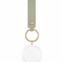 Event-ready acrylic photo keychain set with colorful photo booth accessories and straps, by True Backdrops.