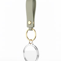 Event-ready acrylic photo keychain set with straps, featuring colorful photo booth accessories by True Backdrops.