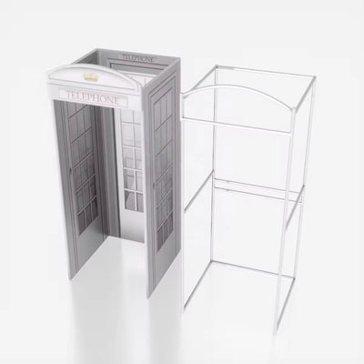 True Backdrops phone booth enclosure with clear glass panels and sleek black frame, designed for modern interior spaces.