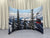 Curved enclosure wall by True Backdrops, featuring smooth fabric surface and sturdy frame for professional photography setup.