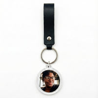 Event-ready acrylic photo keychain set with colorful photo booth accessories and straps, perfect for fun occasions.