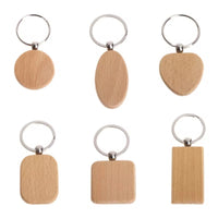 Event-ready acrylic photo keychain set with wooden tags, featuring colorful photo booth accessories by True Backdrops.