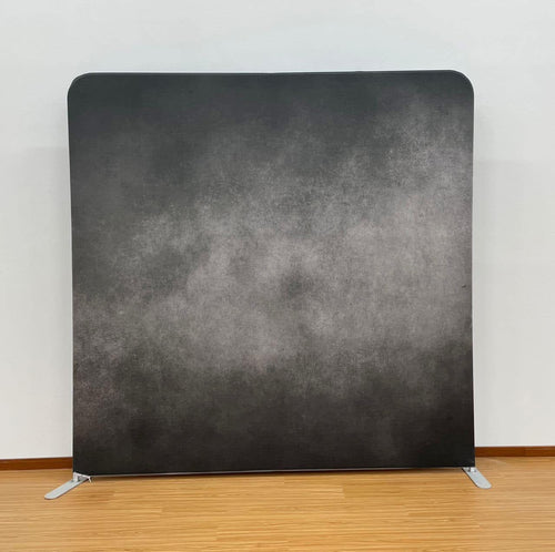 Onyx Storm double-sided backdrop cover by True Backdrops, showing a sleek, professional fabric backdrop with textured black and gray patterns.