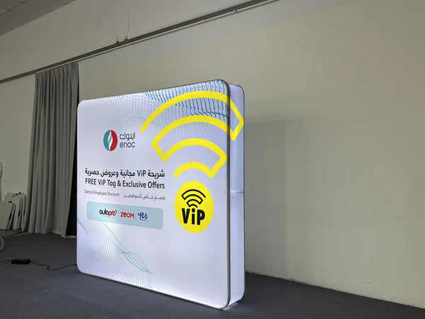 8x8FT 3D light box by RecycleDisplay showing illuminated geometric design with vibrant colors and modern style.