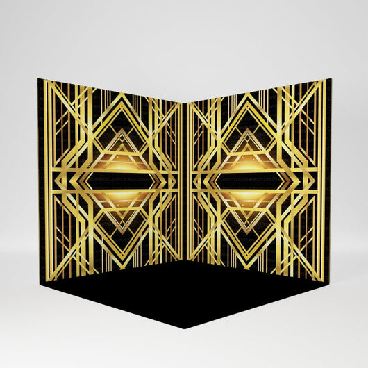 Room scene with RecycleDisplay premium 8x8x8 3D photo booth backdrop in an indoor setting with furniture and lighting.