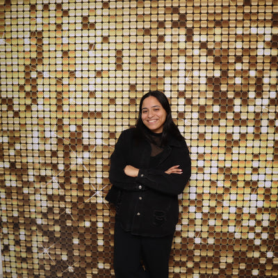 Gold and silver sparkle double-sided pillow cover backdrop by True Backdrops, showcasing shimmering fabric on both sides.