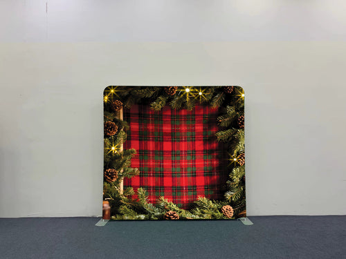 Plaid and pine glow pillow cover backdrop from True Backdrops' Holiday Collection, featuring festive plaid and pine designs.