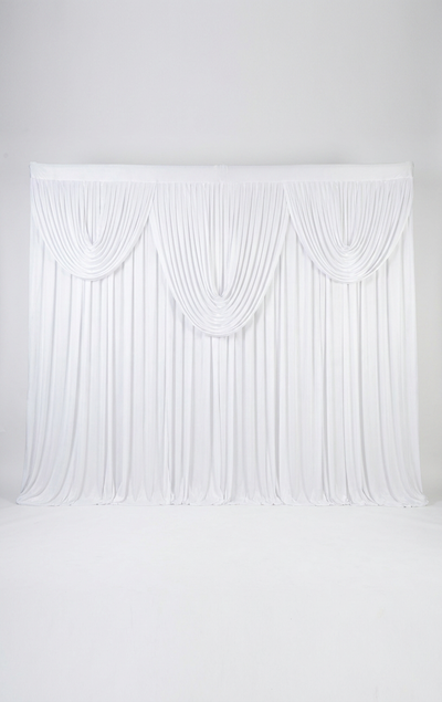 Pre-swagged drapery backdrop with pole pocket from True Backdrops, featuring soft fabric and easy hanging design.