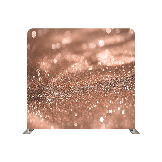 Rose gold glitter blur pillow cover backdrop featuring a shimmering texture and soft fabric, ideal for photography setups.
