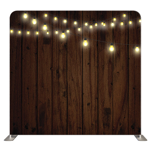 Wood and lights themed Pillow Cover Backdrop from True Backdrops, featuring a rustic wooden surface with soft glowing lights.
