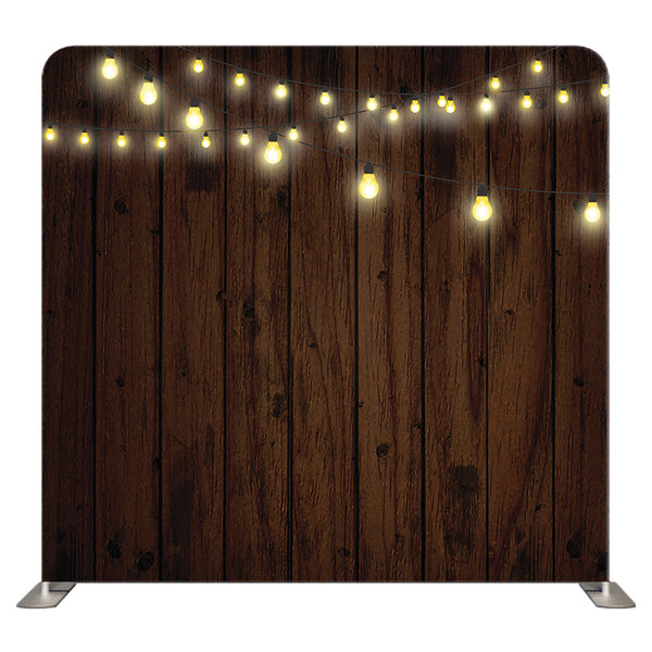 Wood and lights themed Pillow Cover Backdrop from True Backdrops, featuring a rustic wooden surface with soft glowing lights.