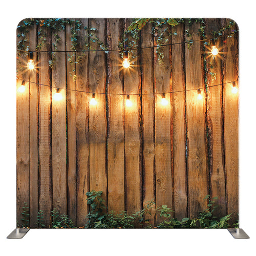 Wood and lights themed pillow cover backdrop by True Backdrops, showcasing a rustic wooden background with warm string lights.